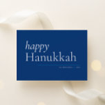 Blue Simple Serif Happy Hanukkah Feiertagskarte<br><div class="desc">Moderne Einfachheit macht diese schlichte,  textbasierte Urlaubskarte in den klassischen Hanukkah-Farben Blau und Weiß zu einem Glanz. Der benutzerdefinierte Backer enthält zwei Ihrer besten Fotos aus dem Jahr und lässt sich leicht mit dem Text der Nachricht personalisieren.</div>