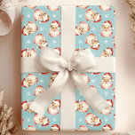Blue Vintag Santa Claus Face Watercolor Geschenkpapier<br><div class="desc">Mit unserem Blue Vintag Santa Claus Face Watercolor Wrapping Paper verwöhnen Sie Ihre Geschenke mit festlichem Beifall! Dieses charmante Design besticht durch nostalgische Aquarellbilder des Weihnachtsmanns, die vor einem lebendigen Hintergrund mit Set und zarten Schneeflocken geschmückt sind. Ideal, um Ihre Urlaubsgeschenke mit einer Touch Vintagen Charmes zu versehen. Dieses Packpapier...</div>
