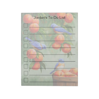 Bluebirds in einer Pfirsichbaumgartenliste Notizblock