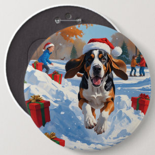 Bluetick Coonhound läuft im Schnee mit Weihnachten Button