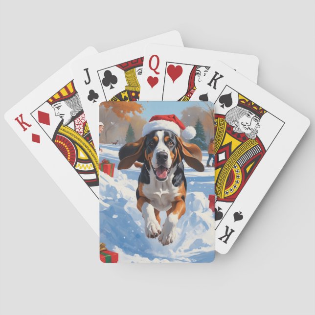 Bluetick Coonhound läuft im Schnee mit Weihnachten Spielkarten (Rückseite)