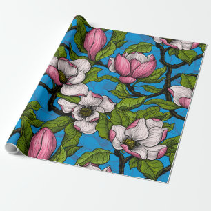Blühende Magnolie auf blau Geschenkpapier