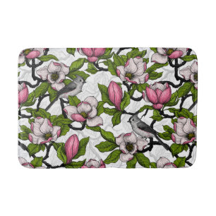 Blühende Magnolie und Titmausvogel Badematte