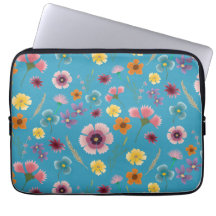 Blume in blauem Laptop