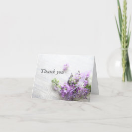 Blume in Lavendel mit Notenblatt danke