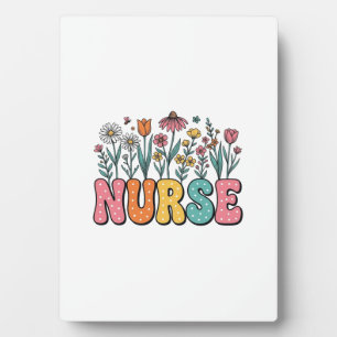 Blumen-Krankenschwester-Blasenbuchstabe im Vintage Fotoplatte