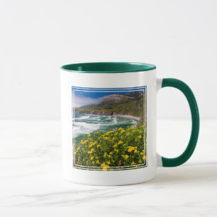 Blumen oberhalb des Sand-Dollar-Strandes Tasse