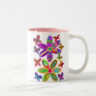 Blumen und Schmetterlings-bunte Tasse