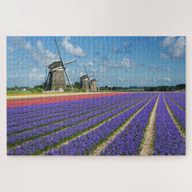 Blumen und Windmühlen in einer Frühlingslandschaft Puzzle (Horizontal)