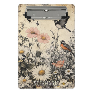 Blumen, Vögel und Schmetterlinge auf gealtertem Pa Mini Klemmbrett