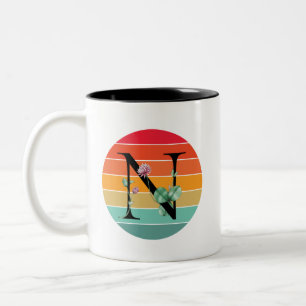 Blumenalphabet N Retro-Sonnenuntergangs-Monogramm Zweifarbige Tasse