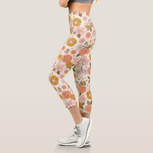 Blumengarten-Muster in Rosa und Orange Capri Leggings