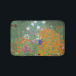 Blumengarten von Gustav Klimt Badematte<br><div class="desc">Schönes farbenfrohes Gemälde eines Blumengartens von Gustav Klimt. Phantastische Farbvariationen und wunderschöne Blume passen einfach wunderschön zu vielen wunderbaren Produkten und Geschenkideen.</div>