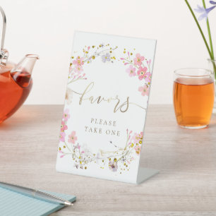 Blumenkranz begünstigt Schild