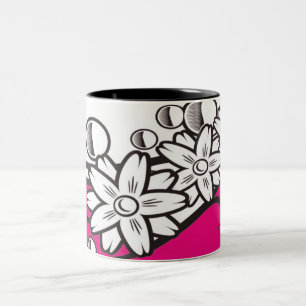 Blumenkunst auf rosa niedriger Tasse