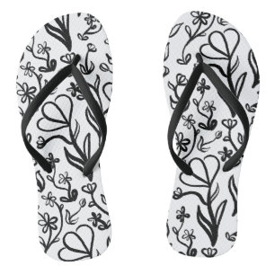 Blumenmuster in Schwarz und Weiß Flip Flops