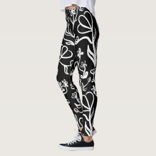 Blumenmuster in Weiß auf Schwarz Leggings