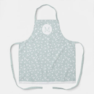 Blumenschneefallmuster Monogramm. Light Sage Green Schürze
