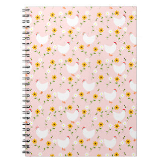Blumenweiße Hühner auf rosa Notebook Notizblock