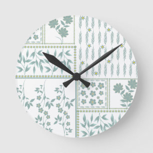Blumenwiederholungs nahtloses Muster texturiert Runde Wanduhr