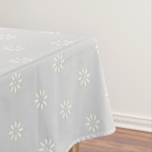 Blumige leichte silbergraue und weiße Tischdecke