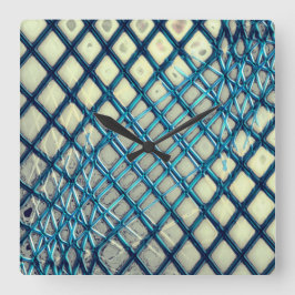 Blurred cyan gray, das wie ein Jute aussieht Quadratische Wanduhr