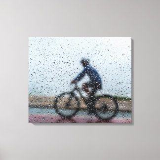 Blurred Cyclist Through Rainy Window Leinwanddruck