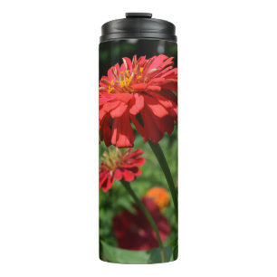 Blütengarten mit rotem Orangenblumen Thermosbecher