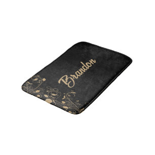 Blütenstaube in Schwarz und Gold Badematte