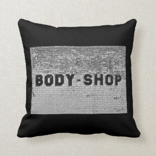 Body Shop auf schwarz Kissen