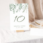 Boho Greenery Foliage Eucalyptus Wedding Tischnummer<br><div class="desc">Boho Greenery Foliage Eukalyptus Wedding Tischnummer. Stilvoll beeindrucken Sie Ihre Hochzeitsgäste mit dieser elegant gestalteten Tischnummer mit wunderschönen grünen Eukalyptus-Blätter auf weißem Hintergrund. Diese Hochzeitsfeier-Tischnummer mit einem schönen grünen Laub-Design, rustikalen und botanischen Farben, ideal für Ihre rustikale, grüne oder eukalyptus-Stil Hochzeit. Die minimalistische und moderne Einrichtung verleiht dem üppig grünen,...</div>