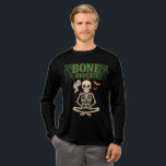Bone Appétit Halloween Skeleton with Cauldron Tri-Blend Shirt<br><div class="desc">Serve up spooky style with this Bone Appétit Halloween skeleton t-shirt, featuring a grinning skeleton in a cross-legged pose holding a skull-shaped cauldron of bubbling green brew. Framed by creepy spiderwebs, playful bats, and a cheeky ghost, this design blends eerie charm with light-hearted humor. Perfect for Halloween parties, trick-or-treat night,...</div>