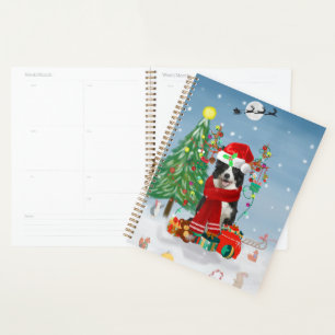 Border Collie Hund im Schnee mit Weihnachtsgeschen Planer