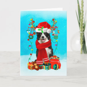 Border Collie im Schnee mit Weihnachtsgeschenken Karte