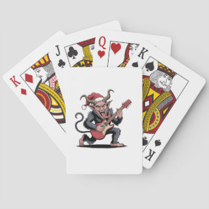 Böser Krampus spielt elektrische Gitarrenmusik zu Spielkarten