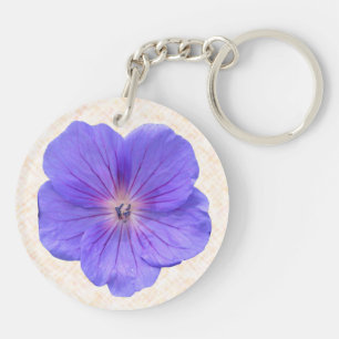 Botanische helle blaue Pelargonie-Blume Schlüsselanhänger