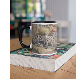 Botanische Szene von Zebras und Löwen in einer Oas Tasse