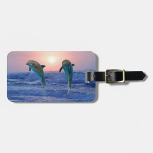 Bottlenose Dolphin bei Sonnenaufgang Gepäckanhänger