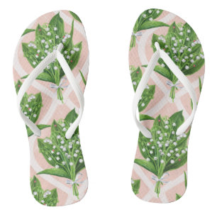 Bouquet der Lilie des Tals Blume auf rosa Flip Flops