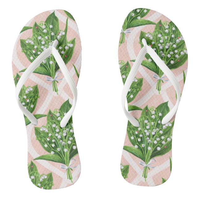 Bouquet der Lilie des Tals Blume auf rosa Flip Flops (Fußbett)