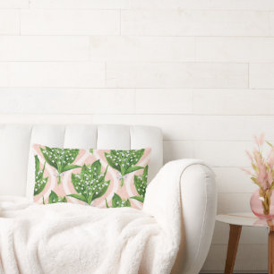 Bouquet der Lilie des Tals Blume auf rosa Lendenkissen