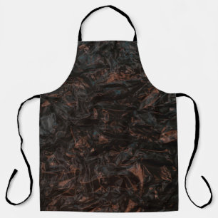 Braune getrocknete Blätter auf gemahlenen Flächen Schürze