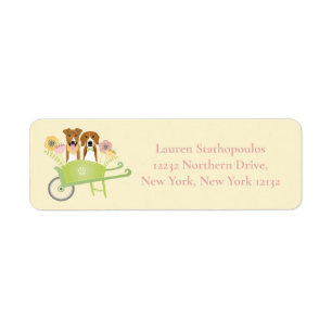 Braune Hunde in Schubkarren Frühlingsblumen