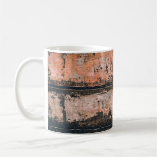Braune und orangefarbene Tafel Kaffeetasse
