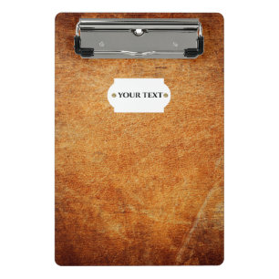 Braune vintage schattierte Leder-Mini-Schreibunter Mini Klemmbrett
