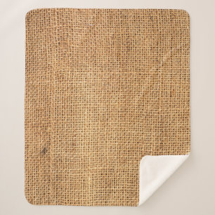 Brauner Burlap-Sack: Texturierter Stoff Hintergrun Sherpadecke