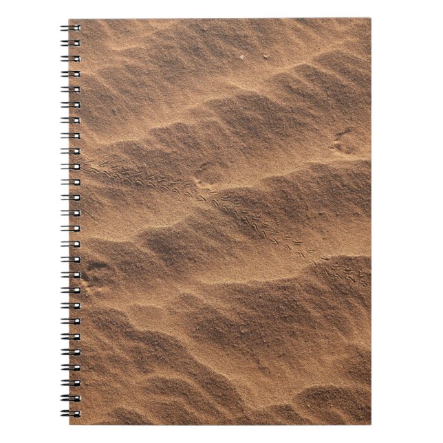 Brauner Sand mit Wasser tagsüber Notizblock (Vorderseite)