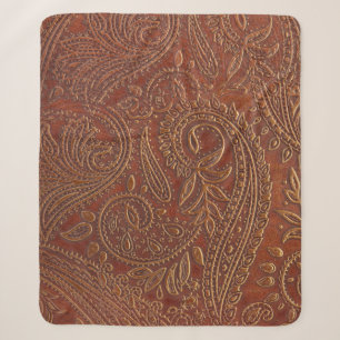 Braunes Leder, gearbeitete Blumenmuster. Sherpadecke