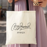 Bridesmaid Personalized Name Tragetasche<br><div class="desc">A clean script “Bridesmaid” design paired with a custom name gives this bag a simple, modern bridal party look. The minimal lettering works well for bachelorette trips, wedding prep, or day-of essentials. Add a name to create a personalized keepsake for each bridesmaid.</div>