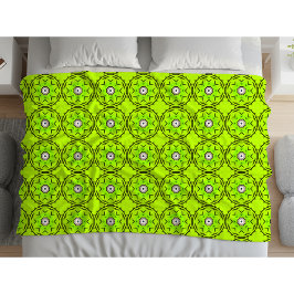 Bright green towel with intricate circular pattern fleecedecke